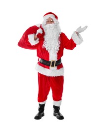 Photo of Man in Santa Claus costume with bag posing on white background
