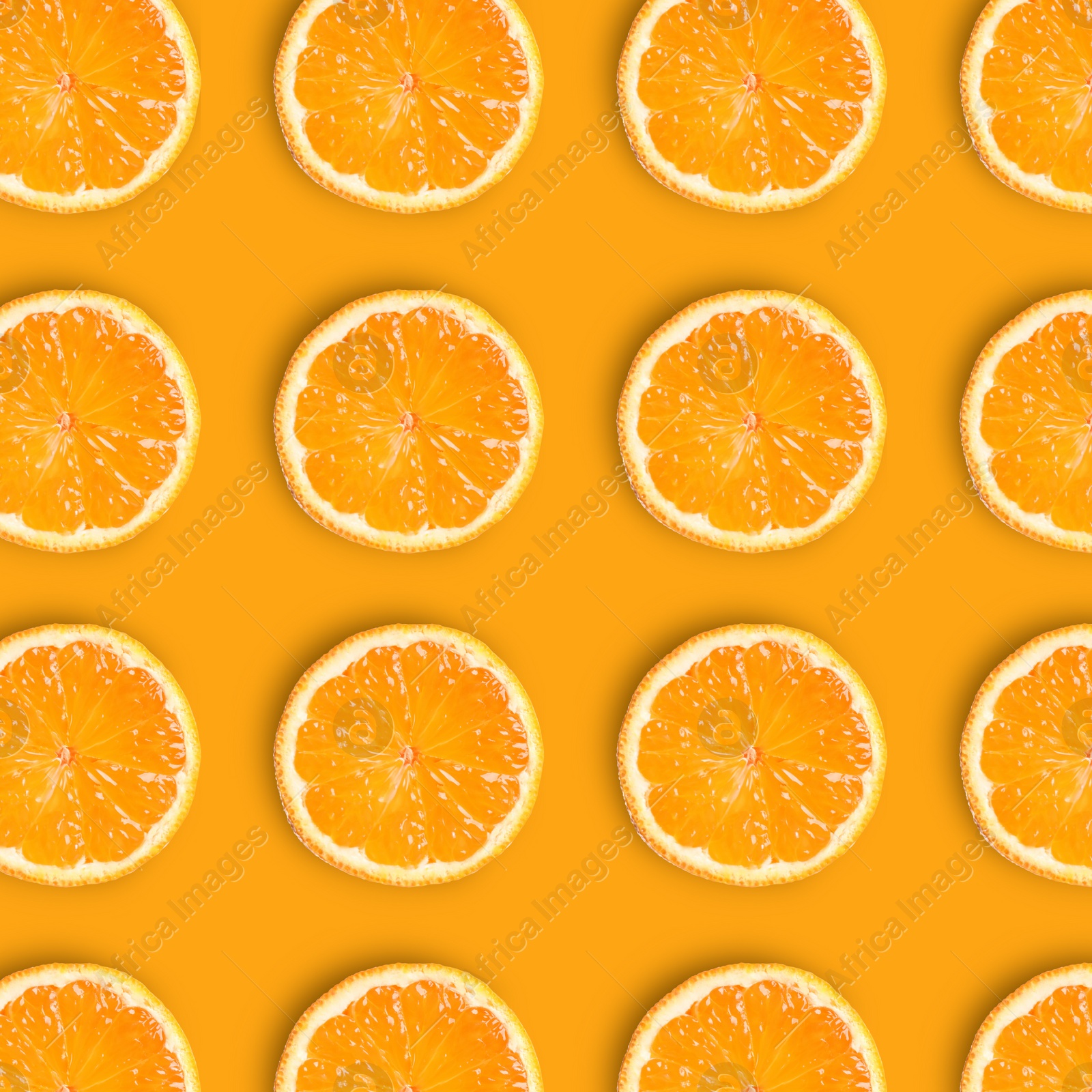 Image of Slices of fresh ripe tangerines on orange background, flat lay