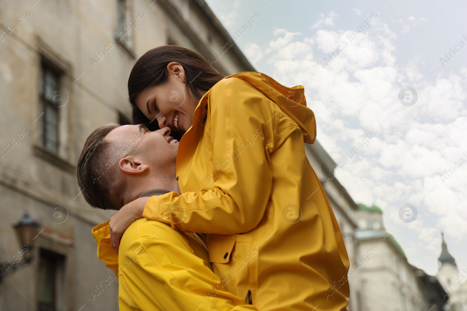 Photo of Lovely young couple together on city street