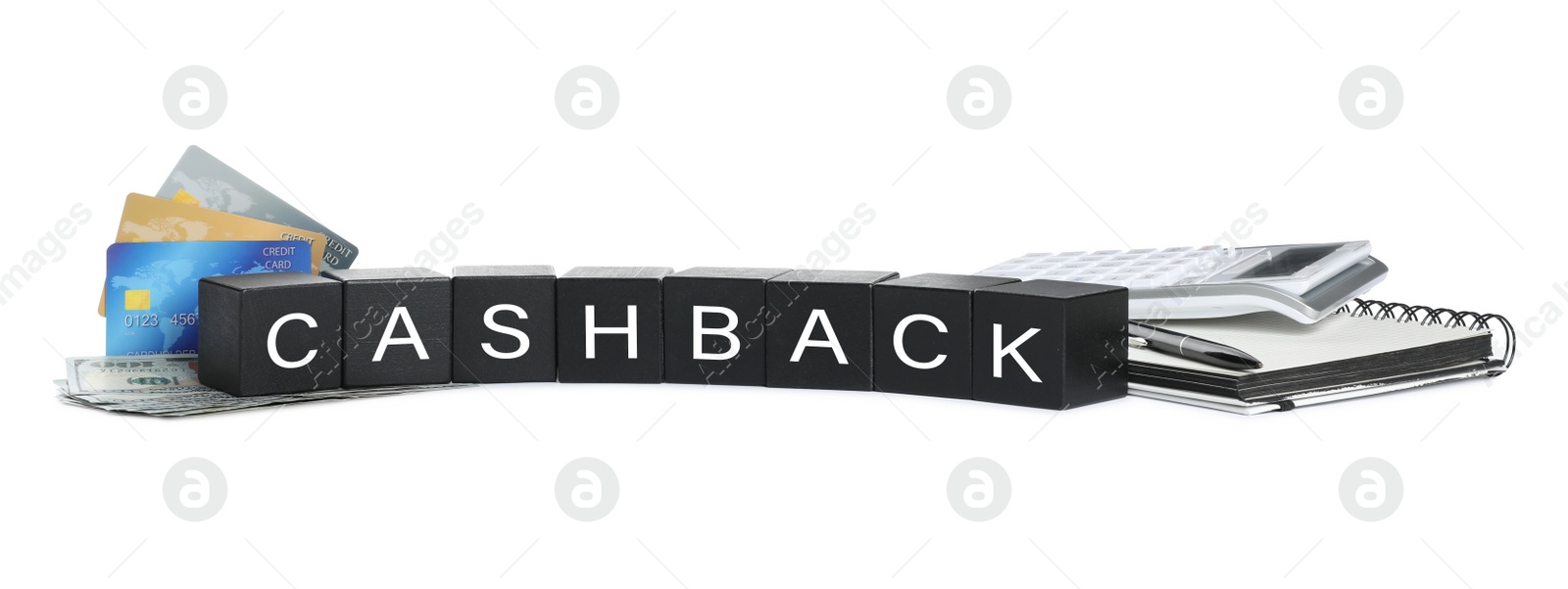 Photo of Composition of black cubes with word Cashback and money on white background