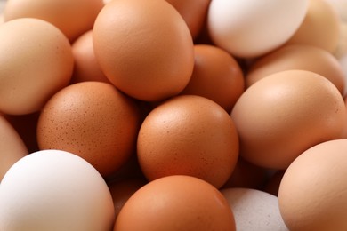Photo of Fresh chicken eggs as background, closeup view