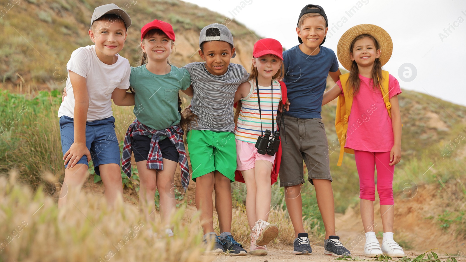 Photo of Cute little children outdoors on summer day. Camping trip