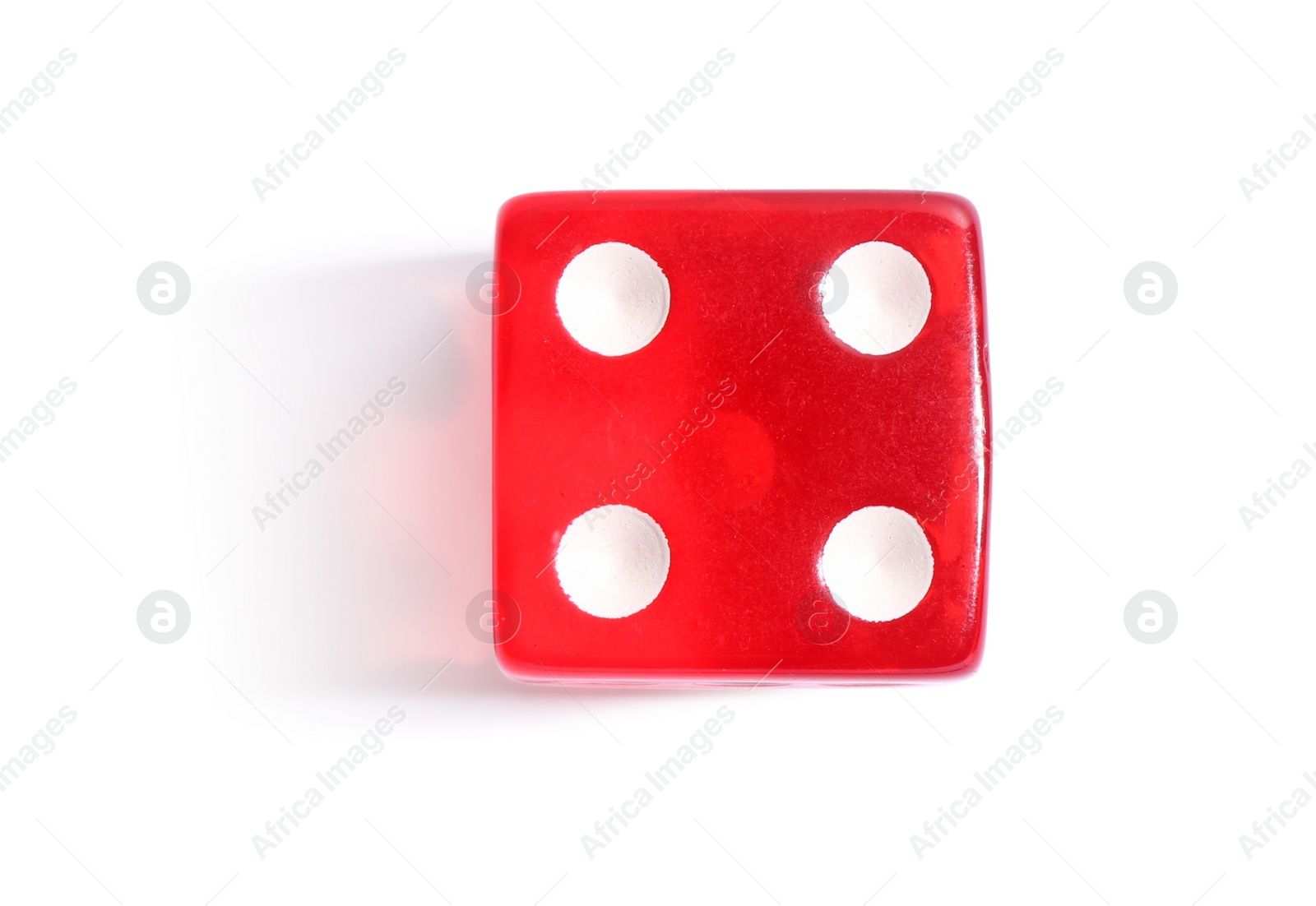 Photo of One red game dice isolated on white, top view