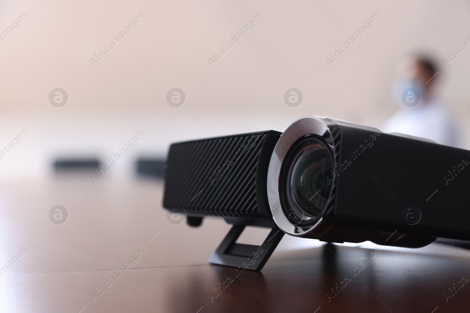 Photo of Video projector on table during medical conference, closeup. Space for text