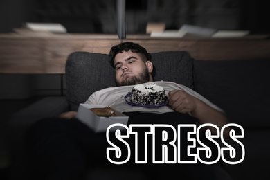 Depressed overweight man with sweets at home and word STRESS 