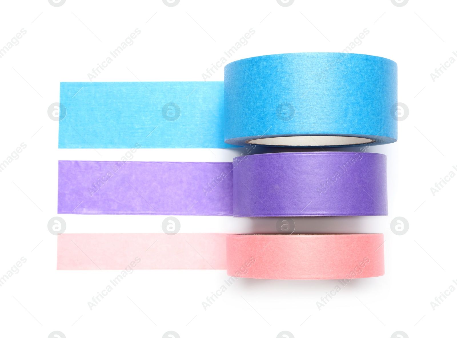 Photo of Different rolls of adhesive tape on white background, top view