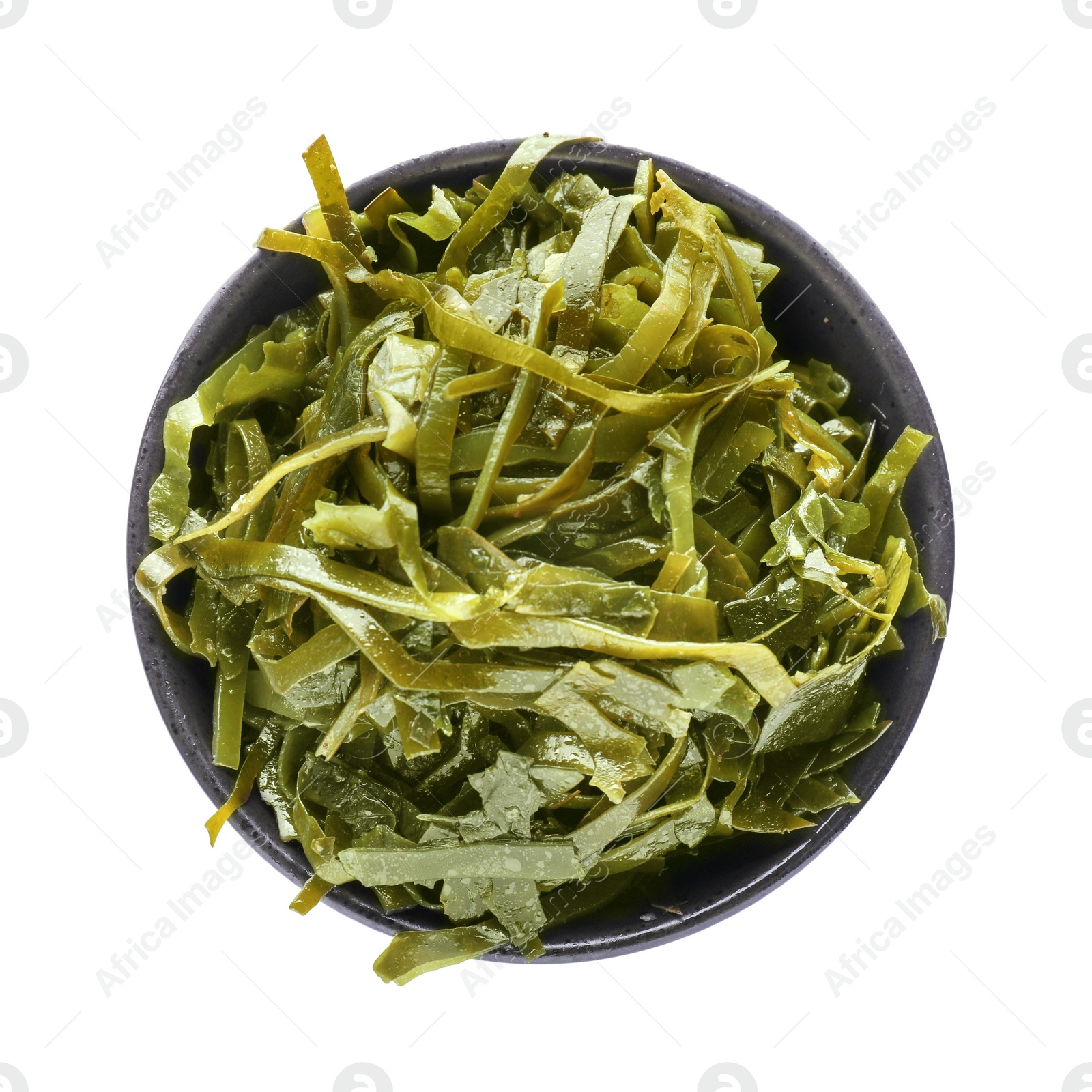 Photo of Fresh laminaria (kelp) seaweed in bowl isolated on white, top view