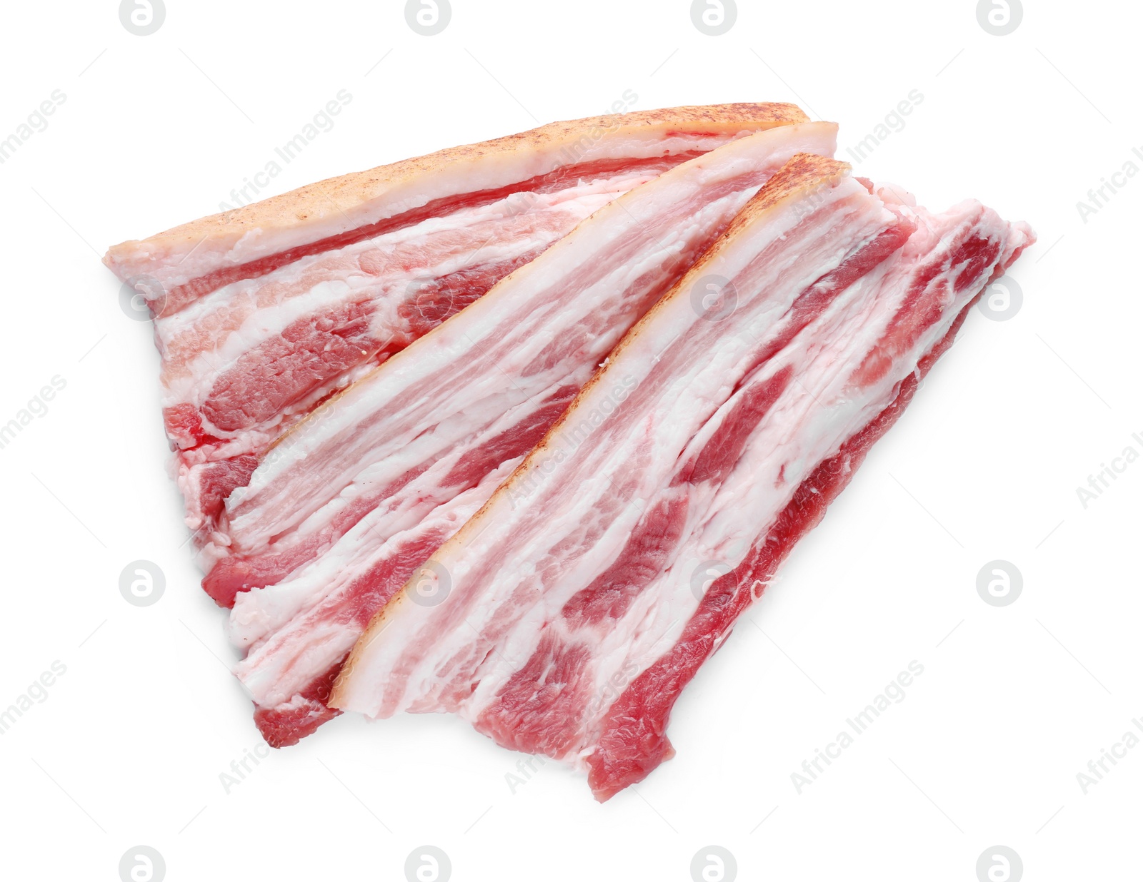 Photo of Slices of tasty pork fatback with spices on white background, top view