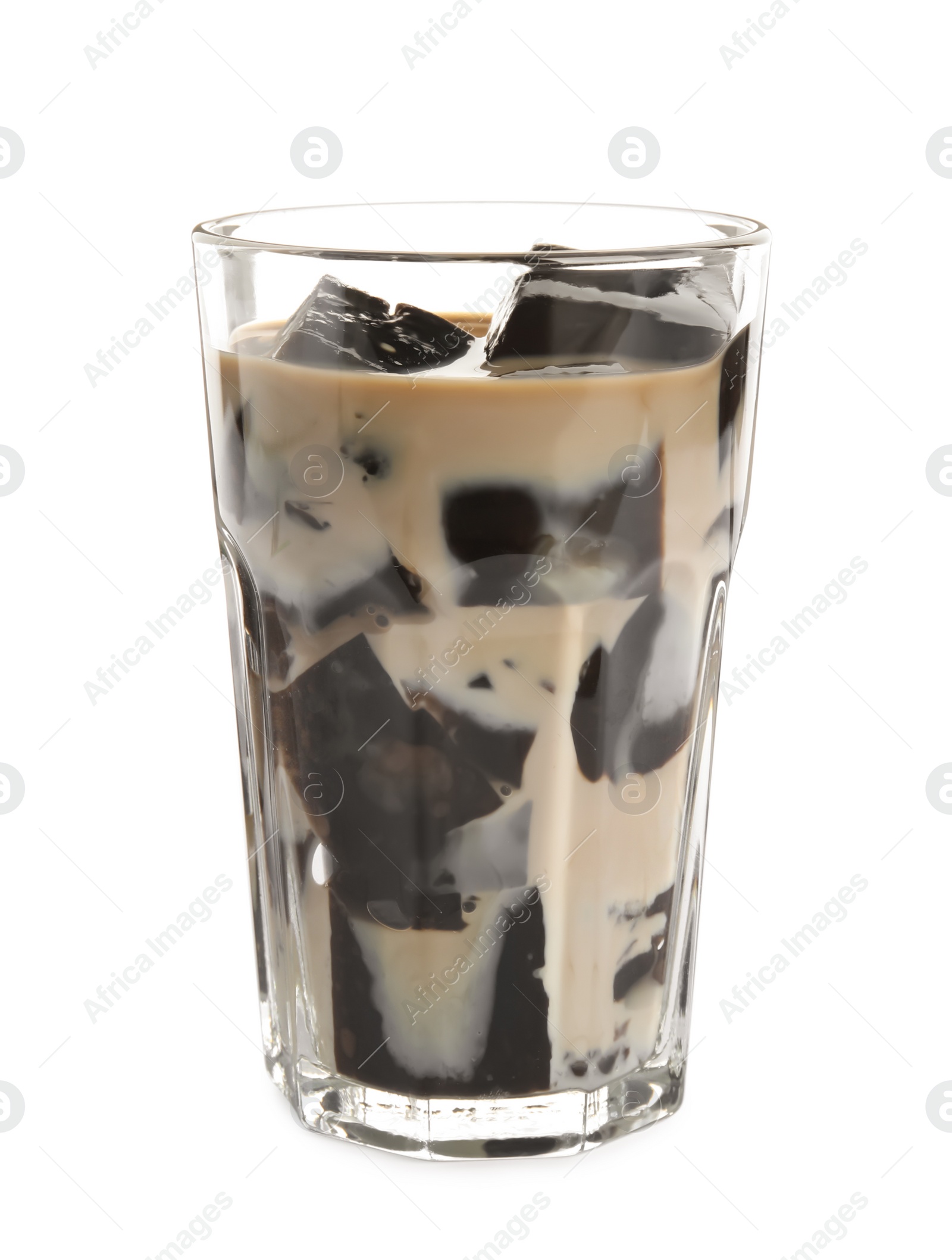 Photo of Glass of milk with grass jelly isolated on white