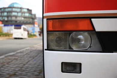 Photo of Modern bus on autumn day outdoors, closeup and space for text. Public transport