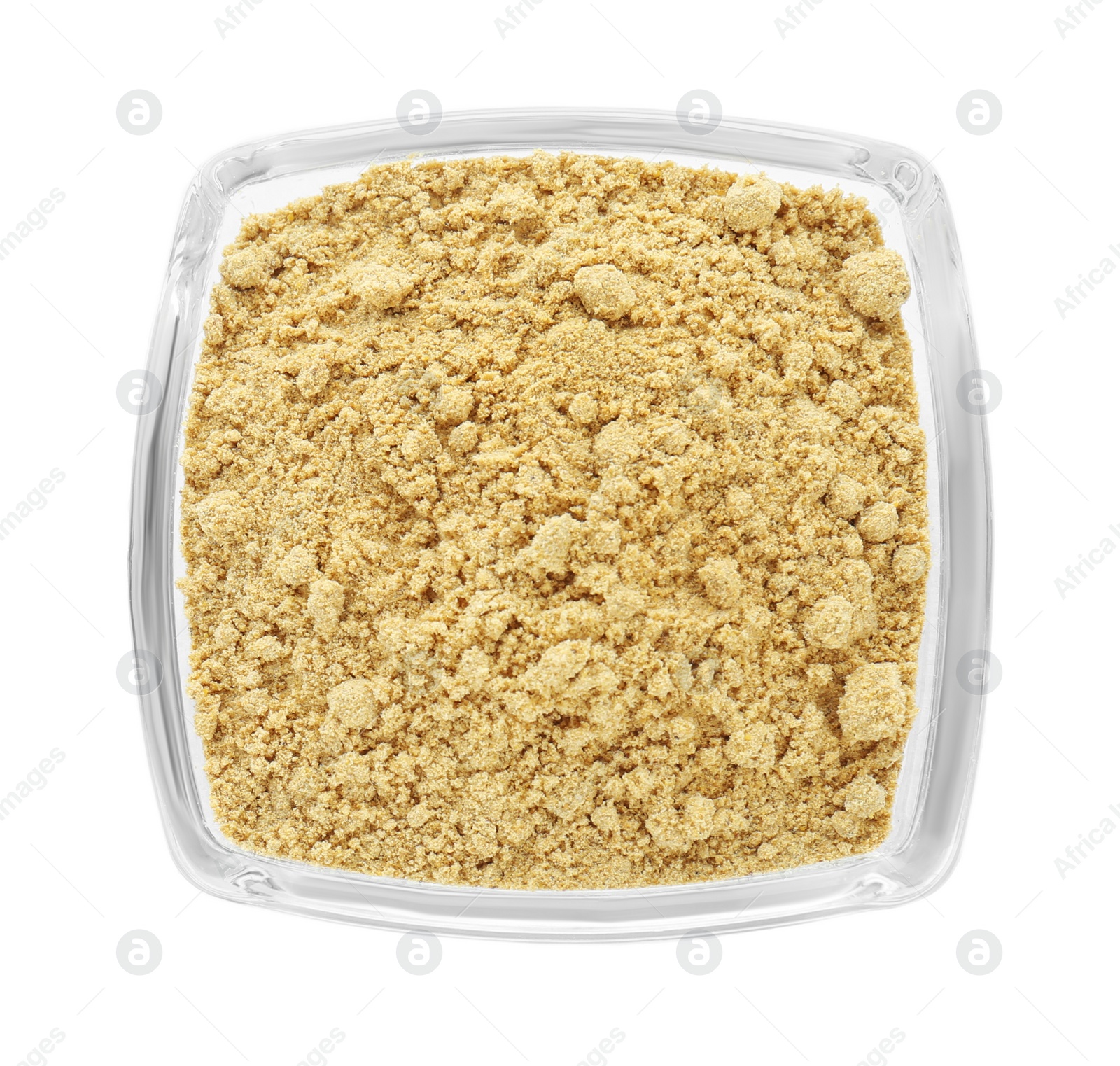 Photo of Aromatic mustard powder in glass bowl on white background, top view