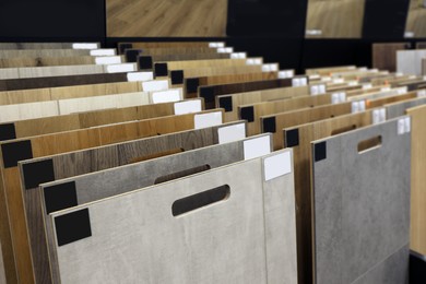 Many different samples of wooden flooring in store