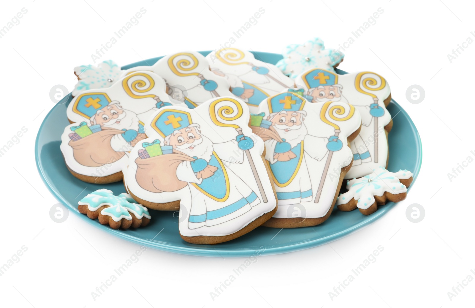 Photo of Tasty gingerbread cookies on white background. St. Nicholas Day celebration