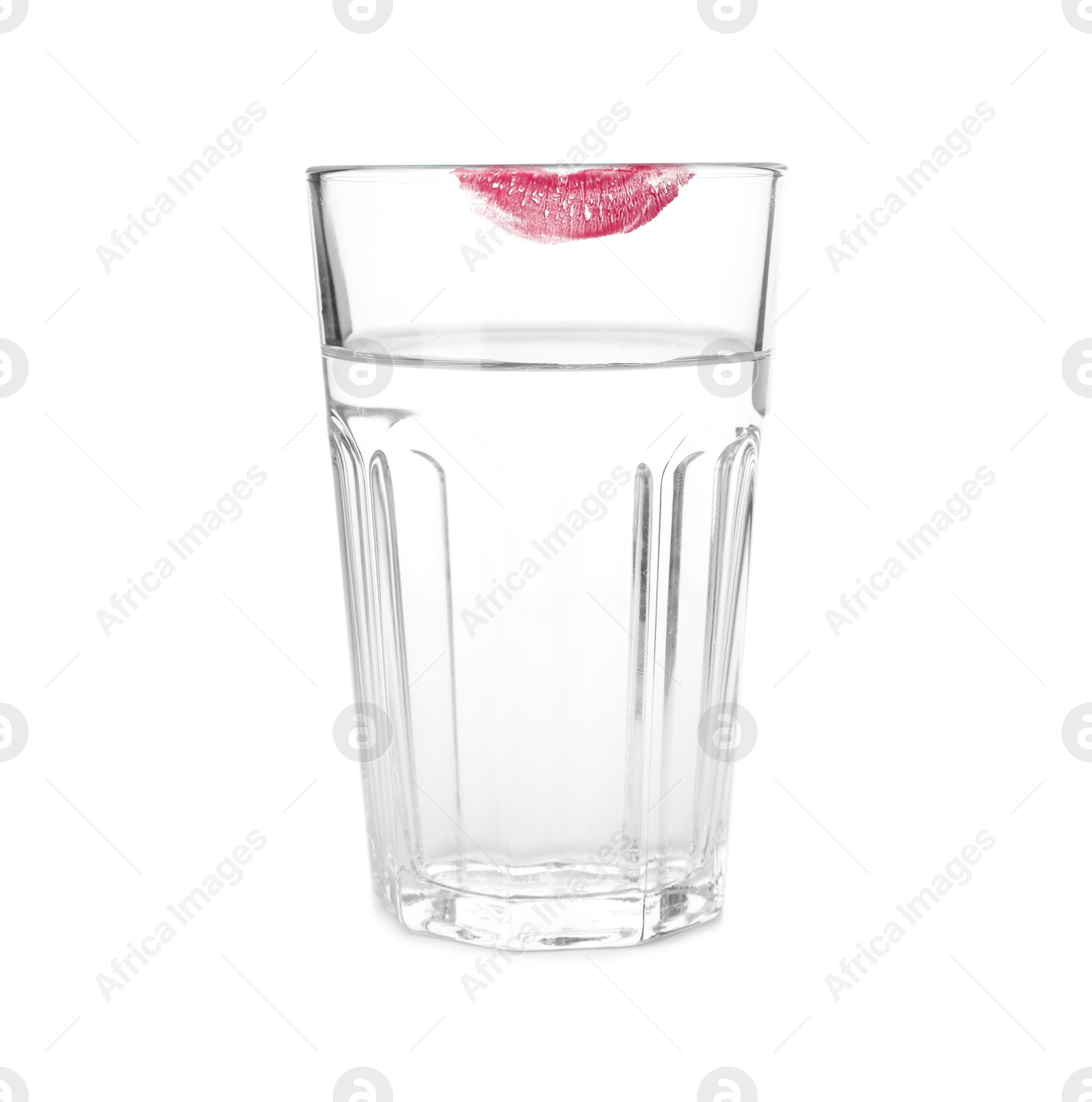 Photo of Glass of water with lipstick mark on white background