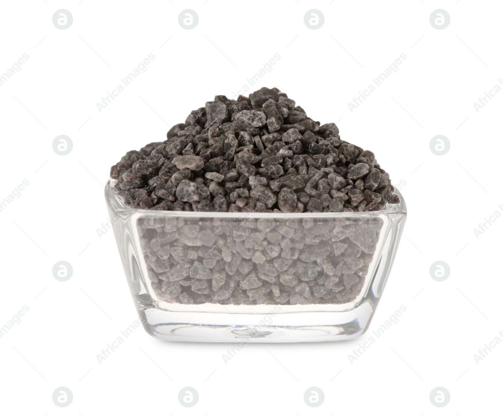 Photo of Black salt in glass bowl isolated on white