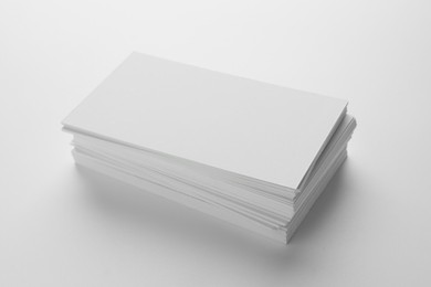 Photo of Blank business cards on white background. Mockup for design