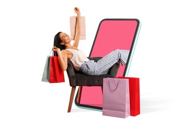 Online shopping. Happy woman with paper bags in armchair looking out from smartphone on white background