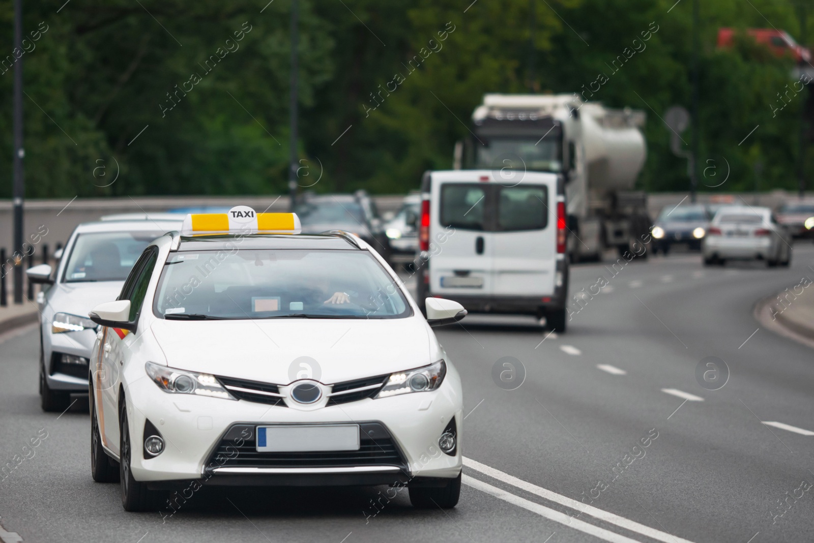 Photo of View of highway with road traffic on summer day