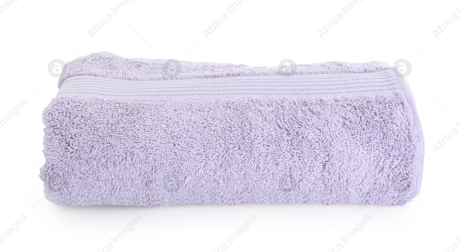 Photo of Folded violet terry towel isolated on white