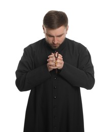 Photo of Priest with rosary beads praying on white background