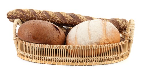 Wicker basket with different types of fresh bread isolated on white