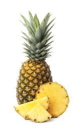 Photo of Tasty raw pineapple with slices on white background