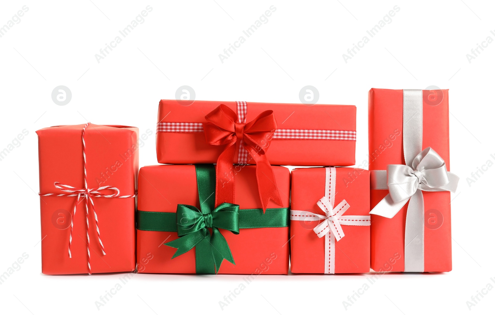 Photo of Beautifully wrapped gift boxes on white background