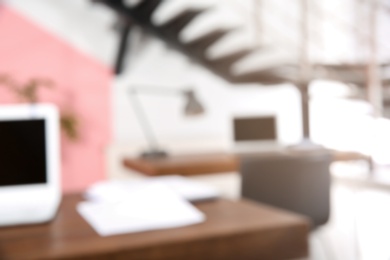 Photo of Modern brightly lit office with bokeh effect