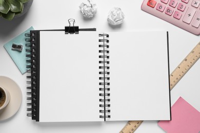 Photo of Flat lay composition with stylish notebook on white table