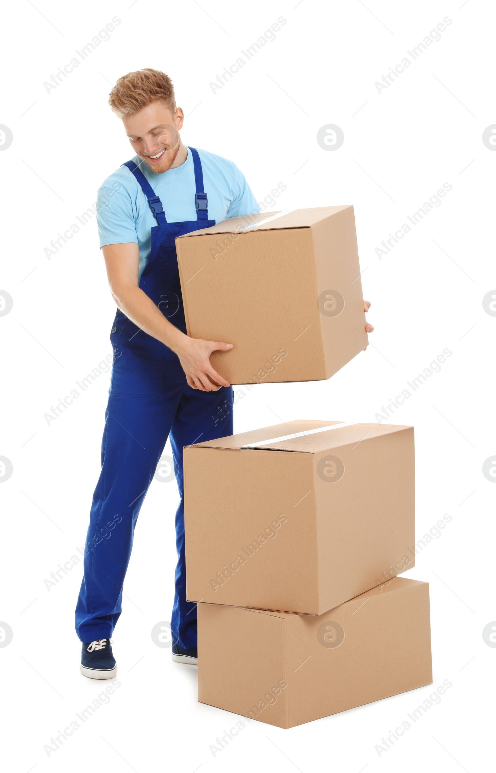 Photo of Portrait of moving service employee with cardboard boxes on white background