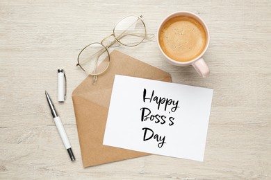 Image of Card with phrase Happy Boss`s Day, envelope, coffee, glasses and pen on wooden table, flat lay