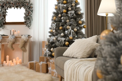 Decorated Christmas tree in modern living room interior