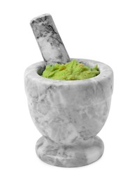 Mortar with delicious guacamole isolated on white