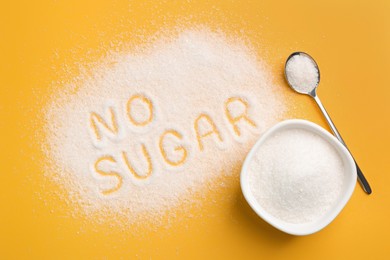 Photo of Flat lay composition with phrase No Sugar on yellow background