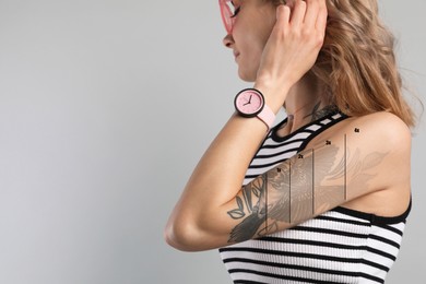 Image of Woman before and after laser tattoo removal procedures on light background. Space for text