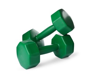 Photo of Green dumbbells on white background. Weight training equipment