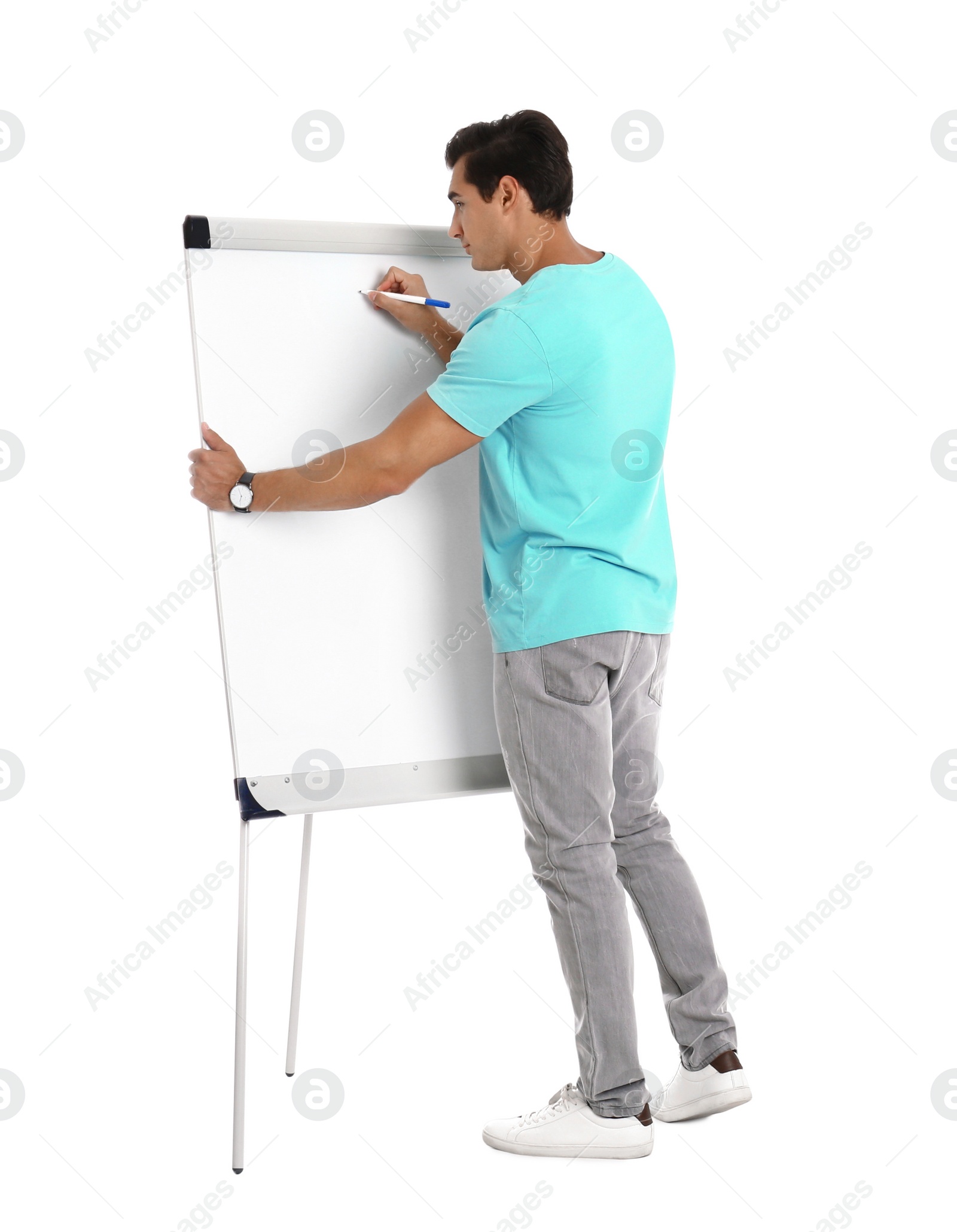 Photo of Professional business trainer near flip chart on white background