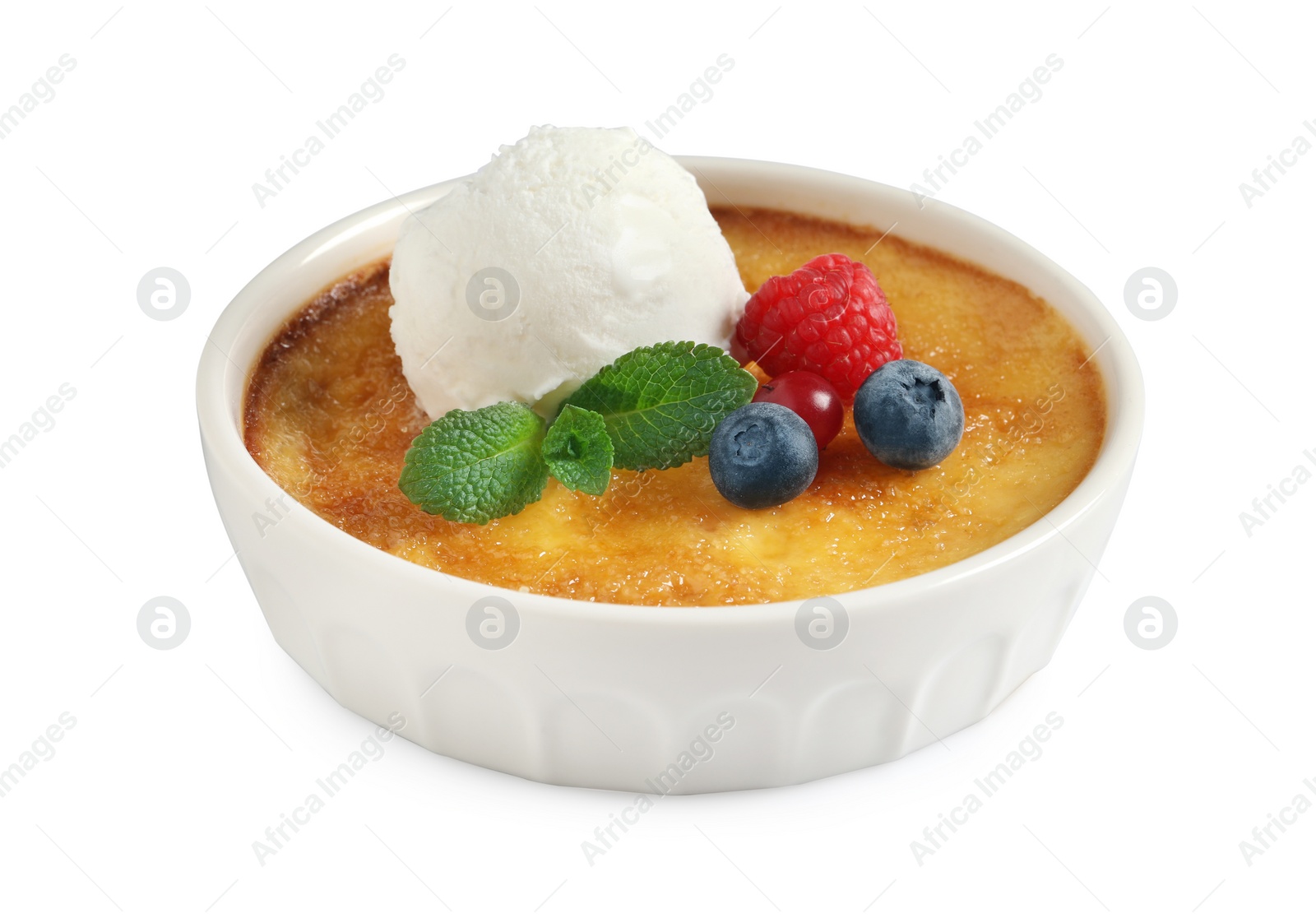 Photo of Delicious creme brulee with scoop of ice cream, fresh berries and mint isolated on white