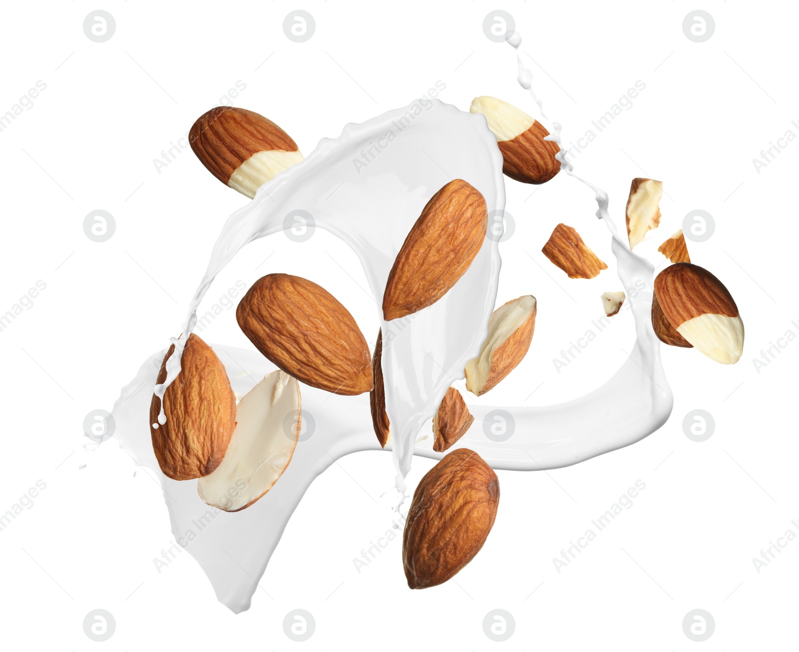 Image of Delicious almond milk and nuts on white background