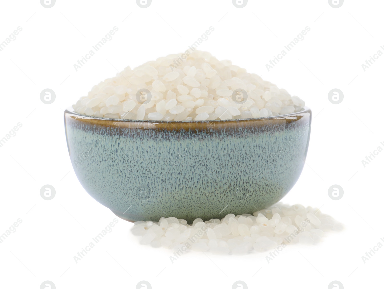 Photo of Bowl with raw rice isolated on white