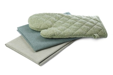 Photo of Kitchen towels and oven glove for hot dishes on white background