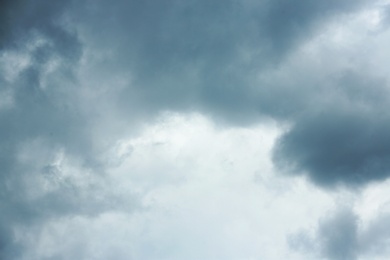 Sky with heavy rainy clouds on grey day