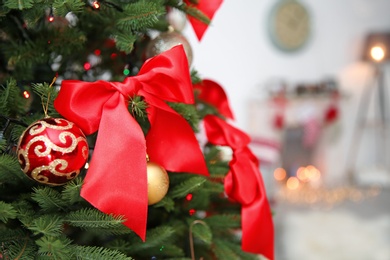 Christmas tree with stylish decor indoors, closeup