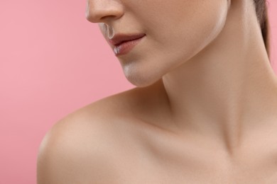 Photo of Beauty concept. Woman on pink background, closeup