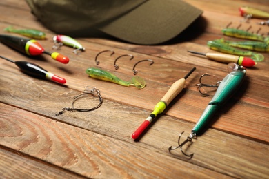 Fishing tackle on wooden table. Recreational activity