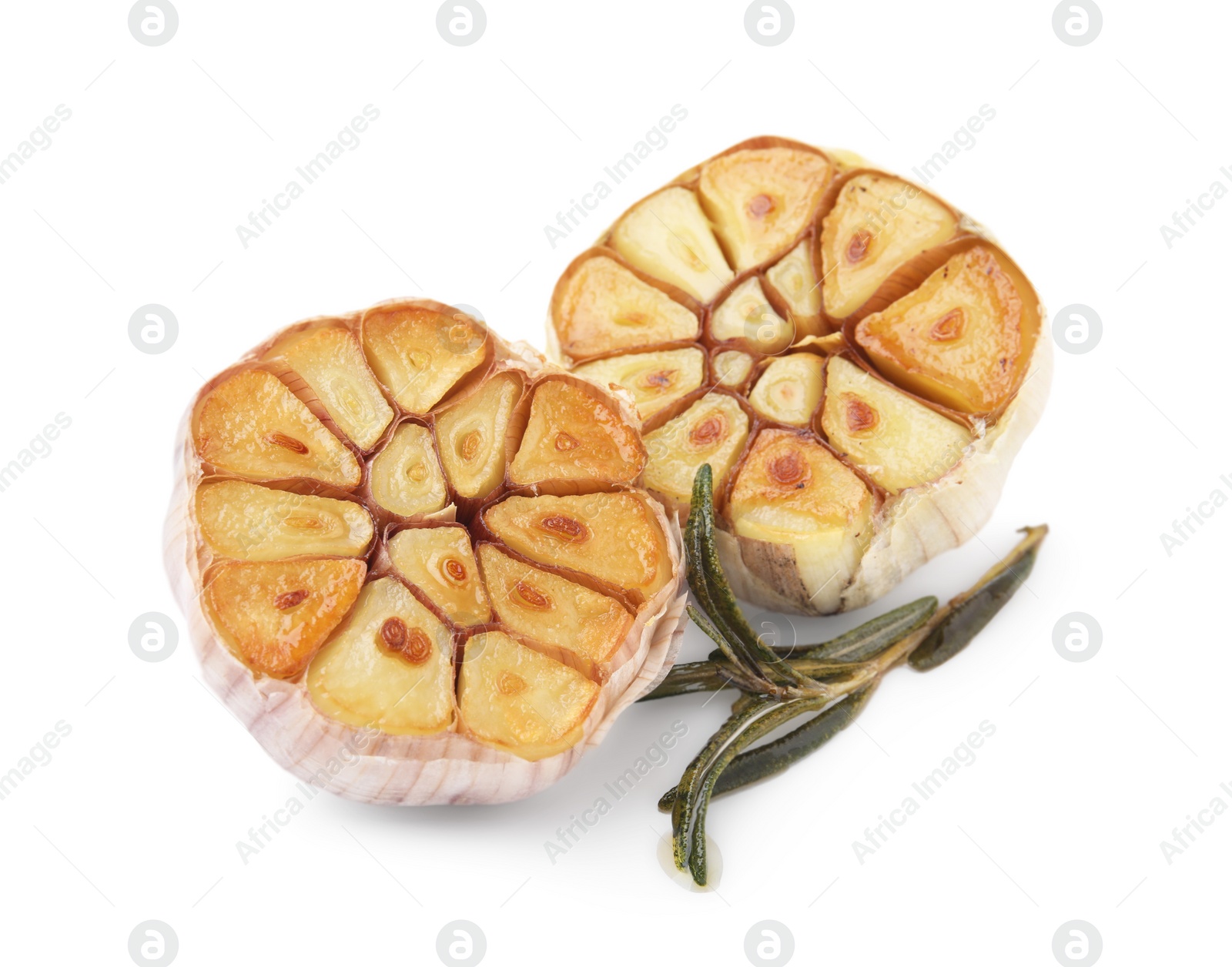 Photo of Heads of fried garlic and rosemary isolated on white