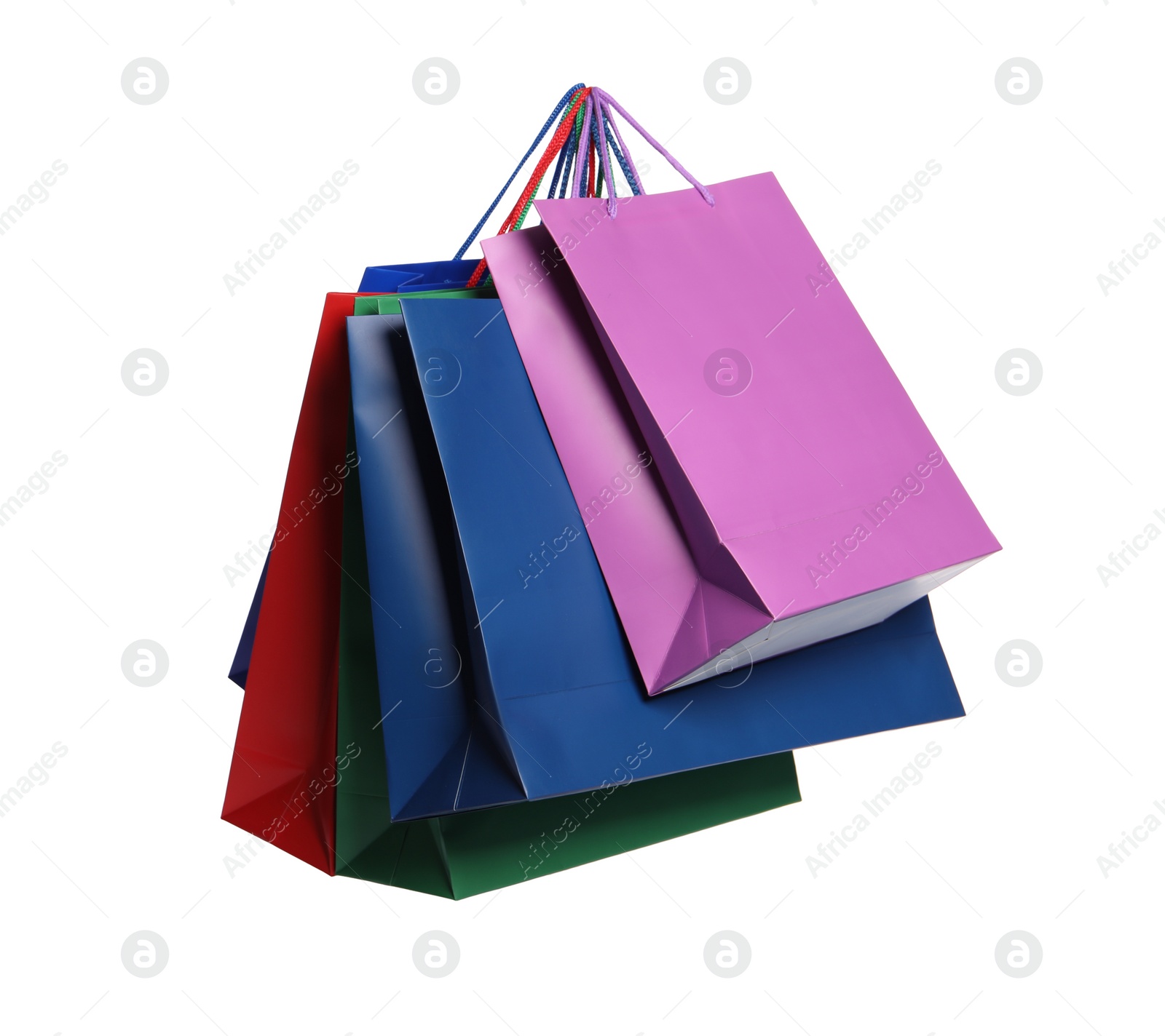 Photo of Colorful paper shopping bags isolated on white