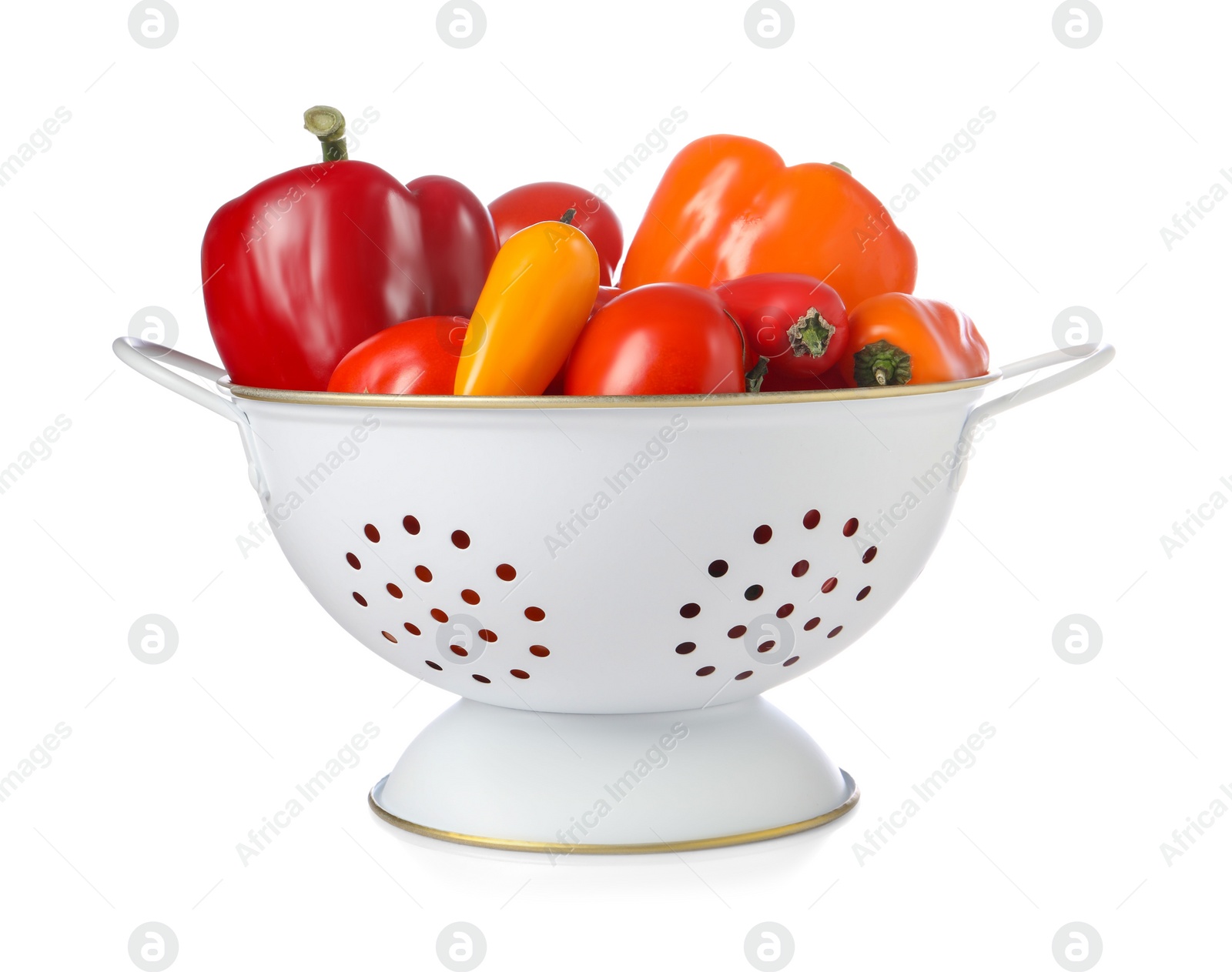 Photo of Colander with fresh vegetables isolated on white