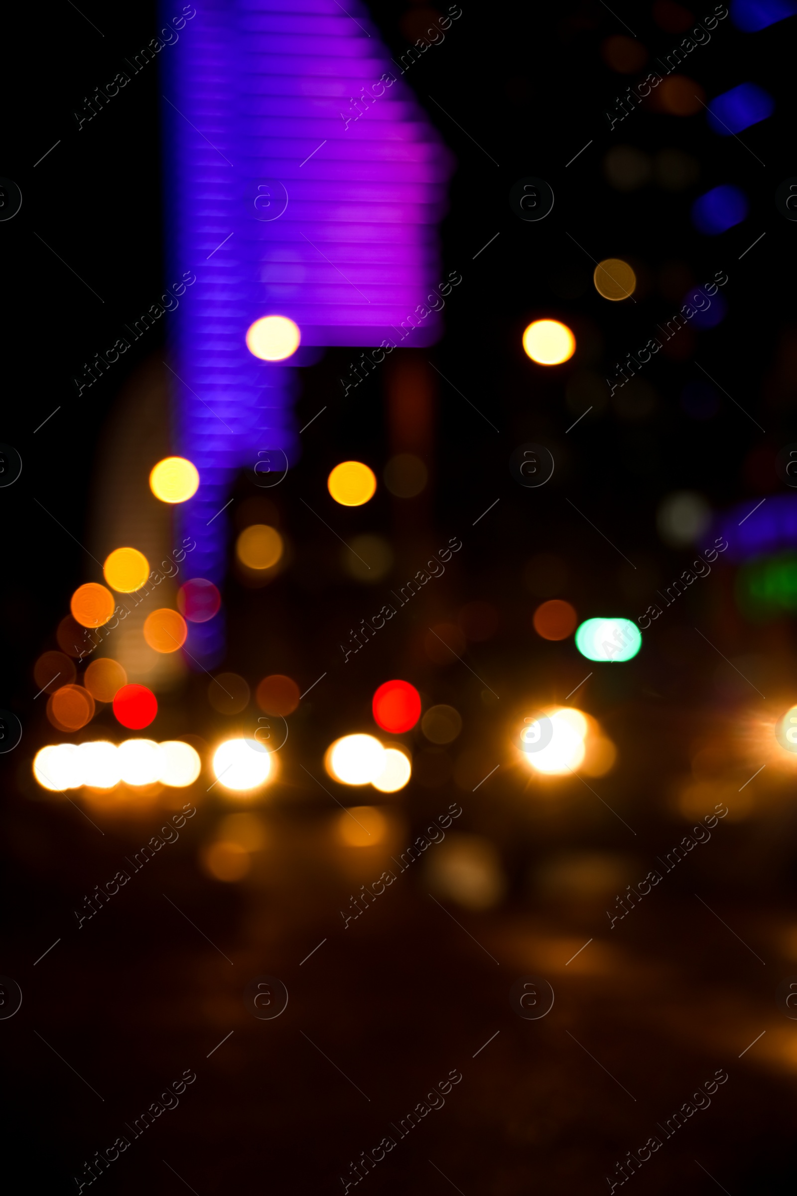 Photo of Blurred view of cityscape with bokeh effect. Night life