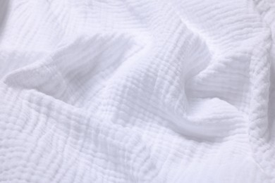 Texture of white crumpled fabric as background, closeup